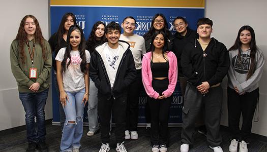 a group of students pose for a photo